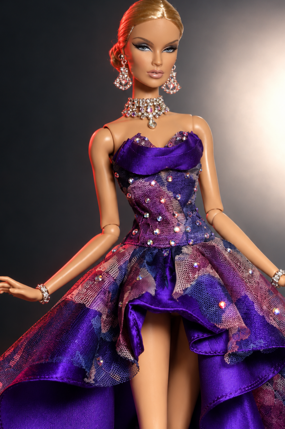 Front detail of the strapless violet neckline, floral mesh and rhinestone bodice