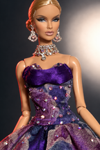 Close-up of the HAUTE gown's folded strapless neckline and rhinestone details
