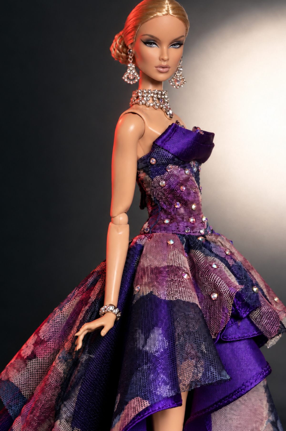 Three-quarter portrait showing the HAUTE purple floral gown's fitted bodice and layered skirt