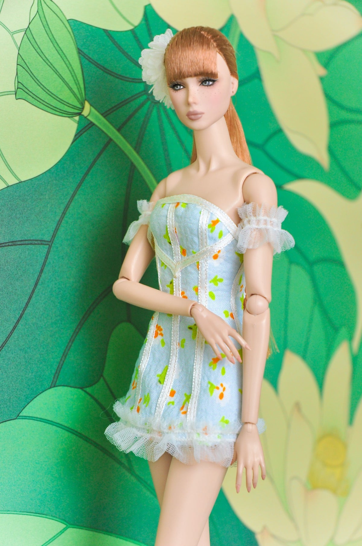 Spring Aura floral corset doll dress with white ribbon seams and sheer ruffle detail